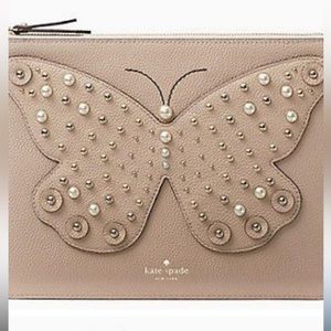 KATE SPADE GIA LARCHMONT AVE
BUTTERFLY CLUTCH!Excellent